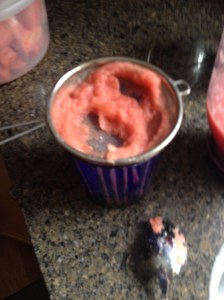 Straining watermelon puree